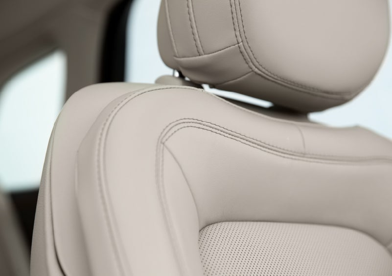 A detail shot of available leather-trimmed Perfect Position front seat shows off artistic details like luxe materials, precision stitching and supple curves | Parkway Lincoln in Dover OH