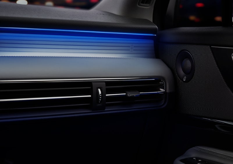 A thin available ambient blue lighting illuminates the pinstripe aluminum under an ebony dashboard, emitting a cool energy | Parkway Lincoln in Dover OH