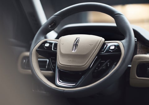 The intuitively placed controls of the steering wheel on a 2024 Lincoln Aviator® SUV | Parkway Lincoln in Dover OH