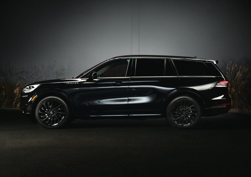 A 2024 Lincoln Aviator® SUV is shown in the Infinite Black exterior color | Parkway Lincoln in Dover OH