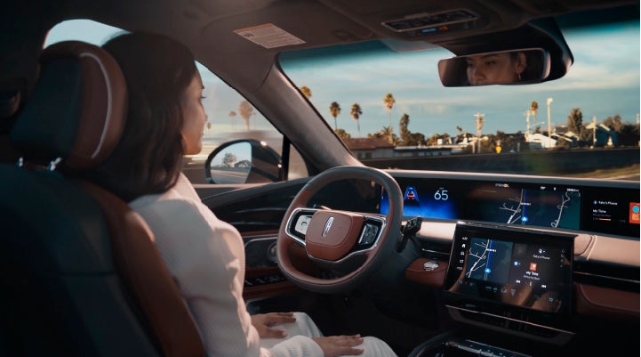 A person is shown driving hands-free on the highway with available Lincoln BlueCruise technology. | Parkway Lincoln in Dover OH